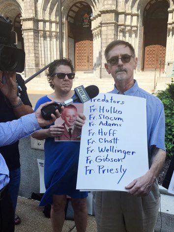David Clohessy, a longtime leader with SNAP, addresses the media near the Cathedral Basilica of St. Louis on Sept. 20, 2016. Clohessy holds a list of abusive priests that SNAP says were brought to St. Louis for treatment from Pennsylvania. Some of the priests could now be deceased. RNS photo by Eric Berger