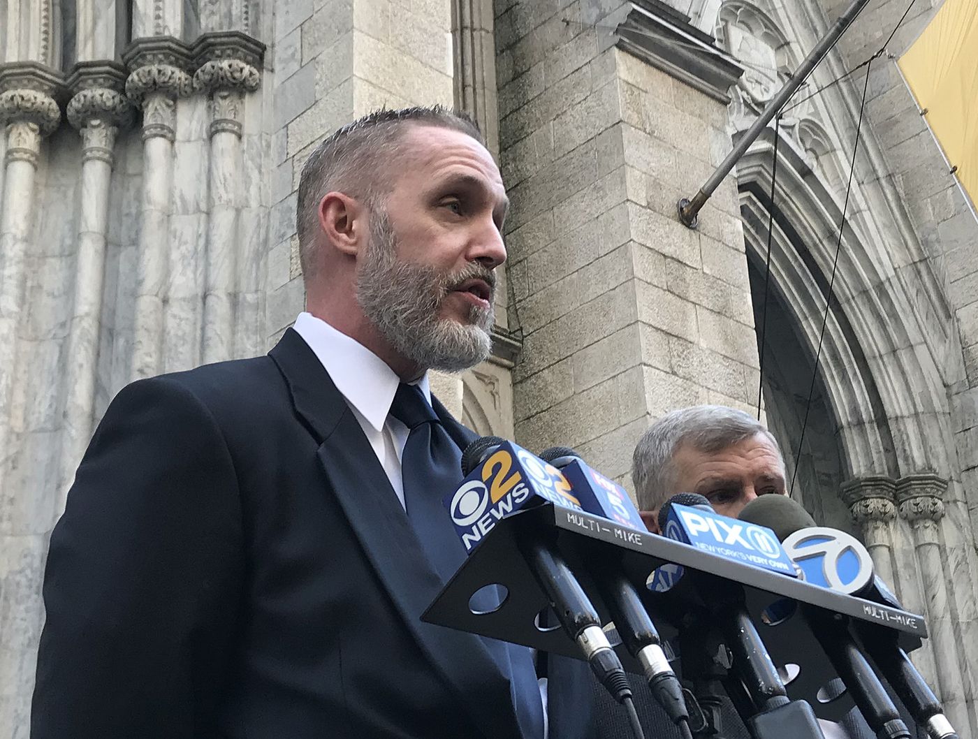 Clergy abuse victim Michael Meenan speaks at a press conference in front of St. Patrick's Cathedral on Thursday. (Ella Torres / New York Daily News)