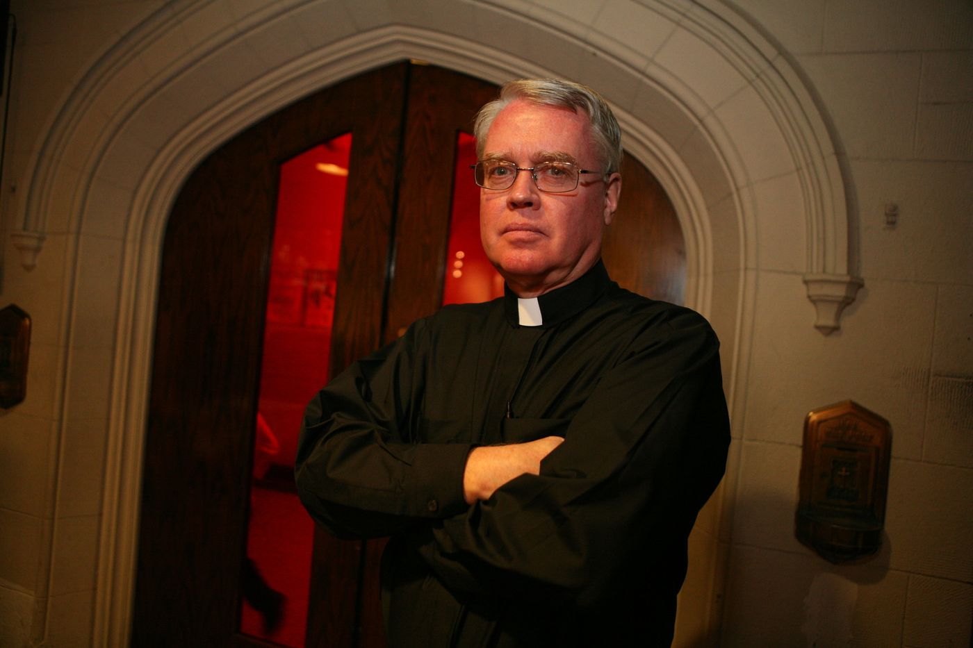 Father John Jenik is pictured inside Our Lady of Refuge Church and School in the Bronx 2007. (Alvarez, Enid / New York Daily News)