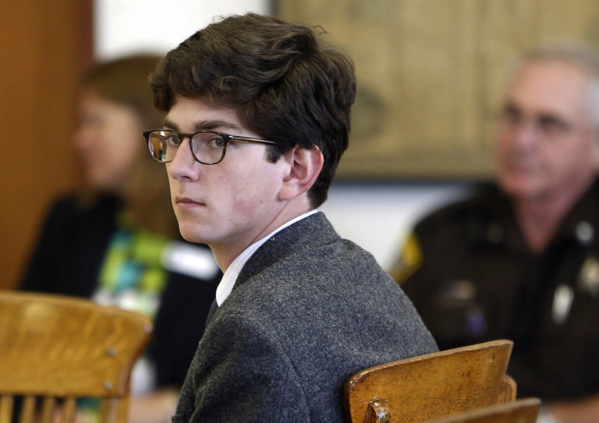 St. Paul's School student Owen Labrie looks around the courtroom at the start of his trial in Concord, New Hampshire on Aug. 18, 2015.Jim Cole / AP file