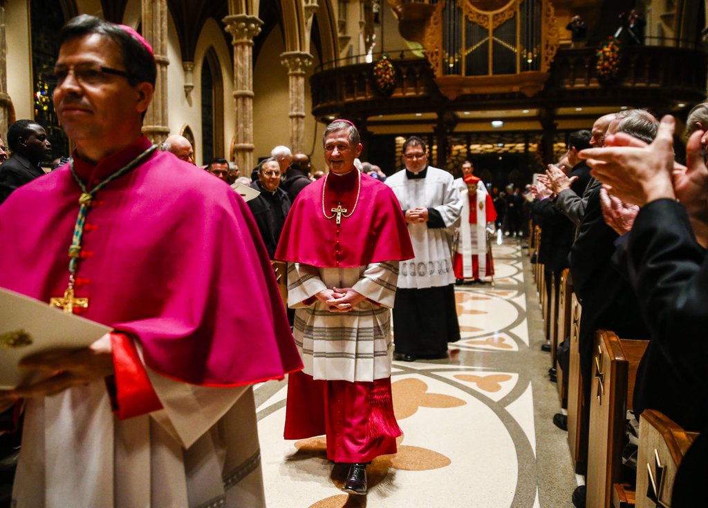 Cardinal Blase J. Cupich, center, the archbishop of Chicago. “I want to express again the profound regret of the whole church for our failures to address the scourge of clerical sexual abuse,” he said in a statement.