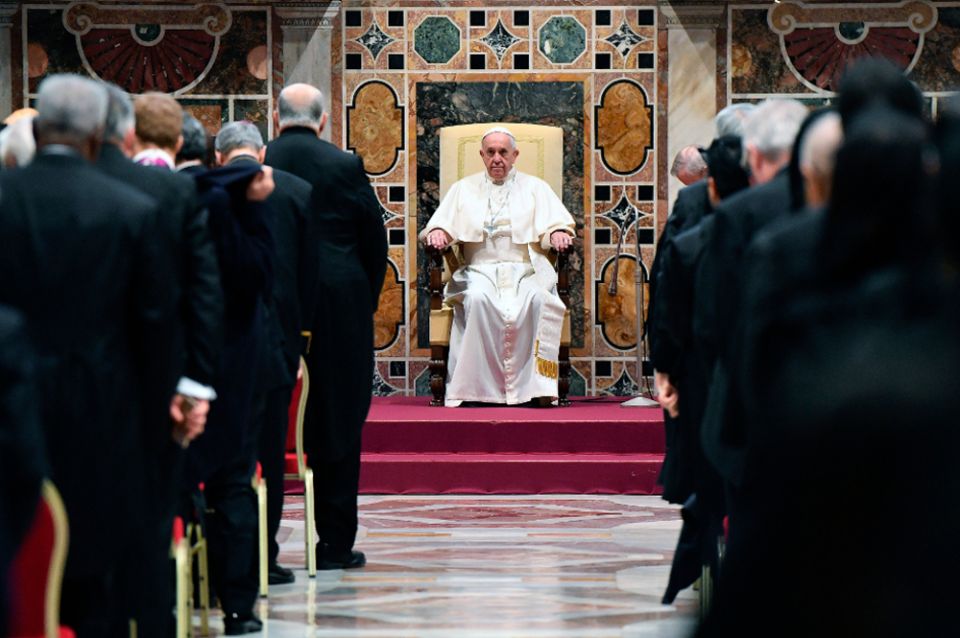 Pope Francis attends an audience with the members of the diplomatic corps accredited to the Holy See for the traditional exchange of New Year greetings at the Sala Regia, at the Vatican, on Jan. 7. (AP/Ettore Ferrari/Pool Photo)