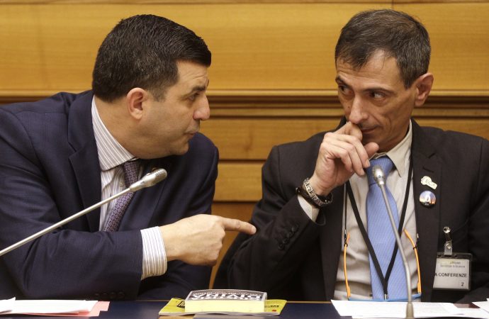 Survivor of sex abuse Francesco Zanardi, right, listens to Mark Rozzi, Democratic member of the Pennsylvania House of Representatives, during a press conference at the Italian Lower Chamber press hall in Rome, Thursday, Feb. 21, 2019. Pope Francis opened a landmark sex abuse prevention summit Thursday by warning senior Catholic figures that the faithful are demanding concrete action against predator priests and not just words of condemnation. (Credit: Gregorio Borgia/AP.)