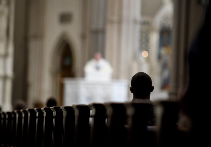 File photo: Parishioners worship during a mass to celebrate the Assumption of the Blessed Virgin Mary at St Paul Cathedral, the mother church of the Pittsburgh Diocese on August 15, 2018 in Pittsburgh, Pennsylvania. Father Alex Castillo, a Roman Catholic Diocese of Oakland priest, fled the country after being accused of sexual misconduct with a male minor.