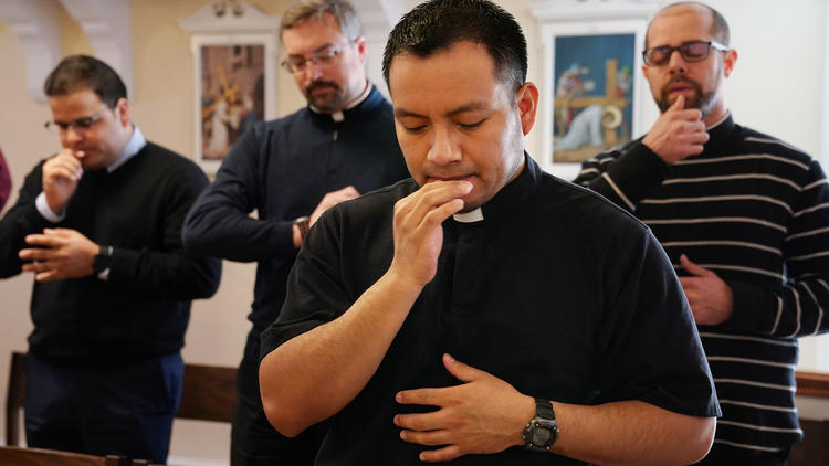 Seminarians attend Mass during their training for the priesthood at Mundelein Seminary on April 3, 2019. (Stacey Wescott/Chicago Tribune)