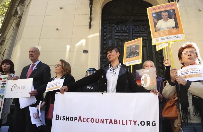 People from organizations representing the victims of alleged abuse by members of the Catholic church, protest outside the archdiocese office in Mendoza, Argentina, Monday, May 6, 2019. Members of online research database BishopAccountability.org and Ending Clergy Abuse are in Argentina demanding the church take a "zero tolerance" policy regarding abuse and put an end to what they describe as cover ups, and in particular are demanding justice in the case of deaf children who were allegedly abused in Mendoza. From left are alleged victim Fran Carrazco, Ending Clergy Abuse member Peter Isely, Bishop Accountability member Anne Barrett Doyle, the mother of an alleged victim, Marta Carina Garcia, and Provolo member Silvia Llaver. (Credit: Marcelo Ruiz/AP.)