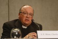 Archbishop Charles Scicluna of Malta speaks at the Vatican during a May 9 news conference. CNS photo by Robert Duncan.