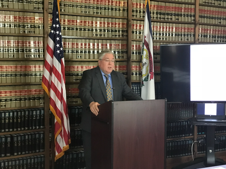 Attorney General Patrick Morrisey address the media at a press conference in his office Thursday afternoon.