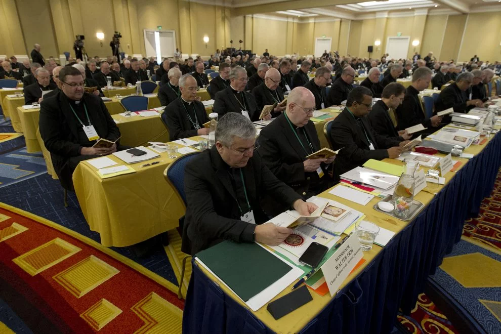 Catholic bishops participate in a morning prayer June 11, 2019, during the U.S. Conference of Catholic Bishops' spring 2019 meetings in Baltimore. (AP Photo/Jose Luis Magana)