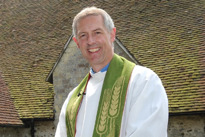Reverend Simon Sayers pictured outside the St Thomas a Beckett Church in Warblington in 2011. Picture: Ian Hargreaves (112692-6c)