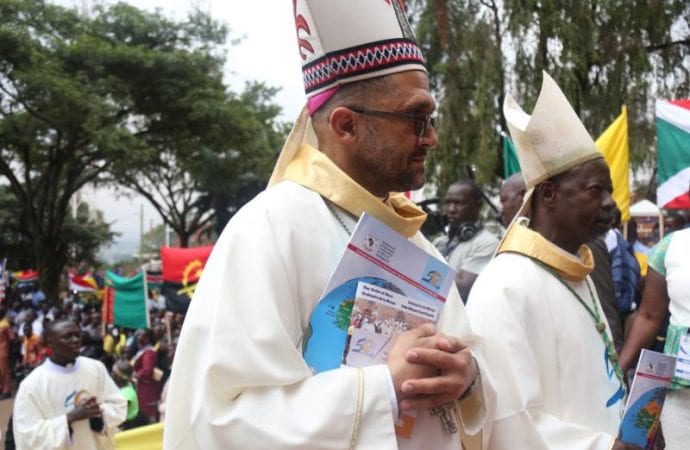 Bishop Sithembele Sipuka of Mthatha, South Africa, second vice president of SECAM, and Bishop Mathieu Madega Lebouakehan of Mouila, Gabon, first vice president, process into St. Mary's Cathedral in Kampala, Uganda, July 21, 2019, for the opening Mass of the weeklong meeting of the Symposium of Episcopal Conferences of Africa and Madagascar (SECAM). (Credit: NS photo/courtesy SECAM.)