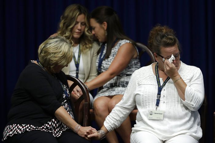 Pennsylvania lawmakers on Thursday ratified measures that are poised to overhaul child sex crimes laws - principally the statute of limitations. Passage of two House measures ends years of stalemate amid calls from victims to reform restrictive laws. In this file photo from Aug. 14, 2018, victims of clergy sexual abuse react to the release of the grand jury report into clergy sex abuse. (AP Photo/Matt Rourke, File)