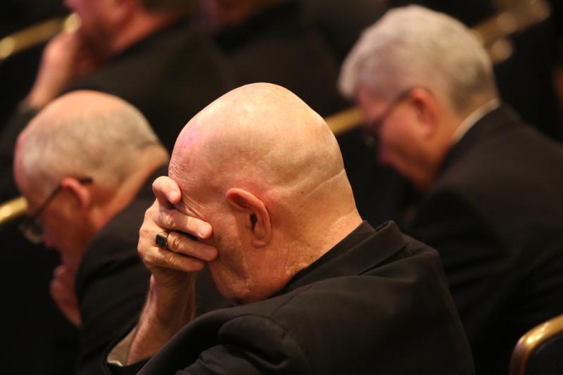 Bishops pray before the Blessed Sacrament in the chapel during a day of prayer Nov. 12, 2018, before hearing from abuse survivors at the fall general assembly of the U.S. Conference of Catholic Bishops in Baltimore. The clergy sexual abuse crisis continued to command a large amount of attention and action from the U.S. bishops throughout 2019. (CNS photo/Bob Roller)