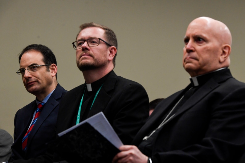 AAron Ontiveroz, The Denver Post From left to right Colorado Attorney General Phil Weiser, Rev. Randy Dollins and Archbishop Samuel Aquila during a press conference to address sexual abuse in the Catholic church on Tuesday, Feb. 19, 2019. Weiser and several of the the Catholic dioceses in Colorado announced a joint initiative to give support to survivors of sexual abuse in the church.