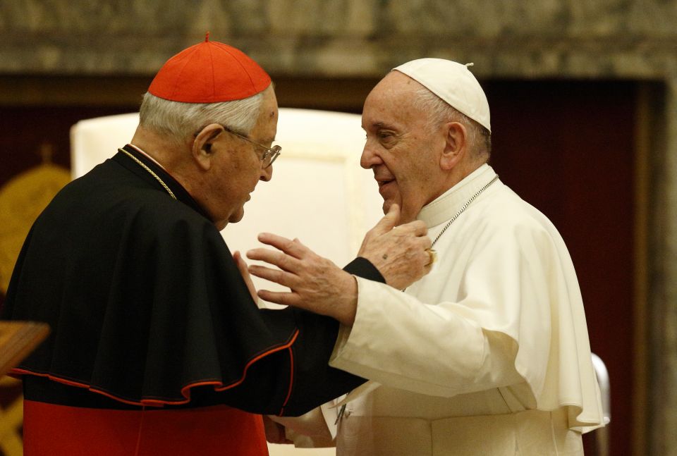 Pope Francis greets Cardinal Angelo Sodano, now dean emeritus of the College of Cardinals, during his annual audience to give Christmas greetings to members of the Roman Curia at the Vatican Dec. 21, 2019. The pope has accepted the resignation of Cardinal Sodano as dean of the College of Cardinals. The pope changed the norms to specify that the dean would be elected to a five-year term, renewable once, instead of being elected for life or until choosing to resign. (CNS photo/Paul Haring)