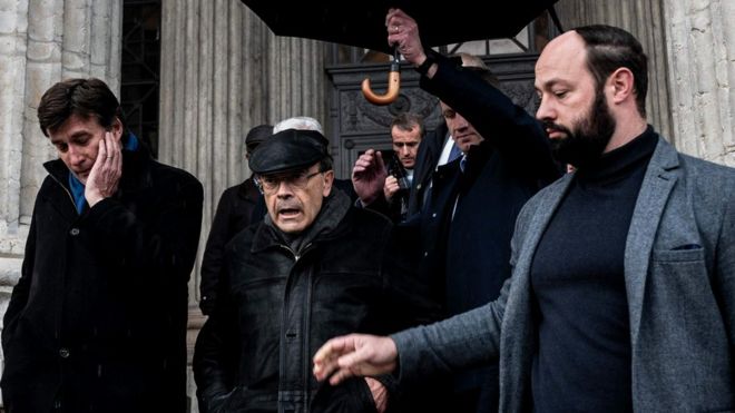 Cardinal Barbarin (wearing a black cap) has appealed his six-month suspended sentence