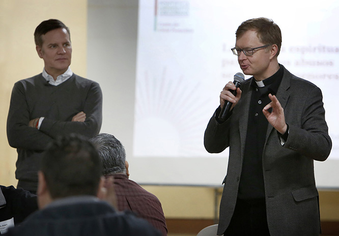 Jesuit Father Hans Zollner, right, and Juan Carlos Cruz speak to bishops, priests, deacons, men and women religious and seminarians at St. Gall Church, 5511 S. Sawyer Ave., on March 2. Karen Callaway/Chicago Catholic