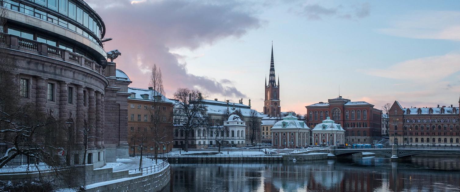 The Swedish Parliament House (left) and the Riddarholm Church(right) in Stockholm. Photo by chas B via Creative Commons license