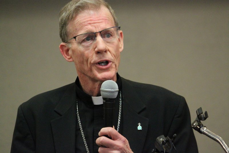 FILE - In this Nov. 29, 2018, file photo, Archbishop John C. Wester, head of the Archdiocese of Santa Fe, tells reporters the diocese will be filing for Chapter 11 bankruptcy protection next week as clergy sex abuse claims have depleted its reserves. An attorney said Monday, March 10, 2020, he is considering challenging the Archdiocese of Santa Fe's movement of assets before it filed for bankruptcy amid allegations of clergy abuse. (AP Photo/Susan Montoya Bryan, File)