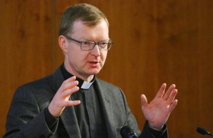 Jesuit Father Hans Zollner, a leading Vatican official dealing with clergy sexual abuse in the church, speaks about “The Present Status of Safeguarding in the Church” at St. Gall Church in Chicago March 2. (CNS photo/Karen Callaway, Chicago Catholic)