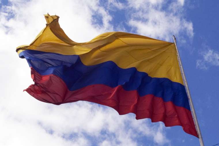 The flag of Colombia. Credit: Politicnico Grancolombiano Departamento de Comunicaciones via Flickr (CC BY-NC 2.0).