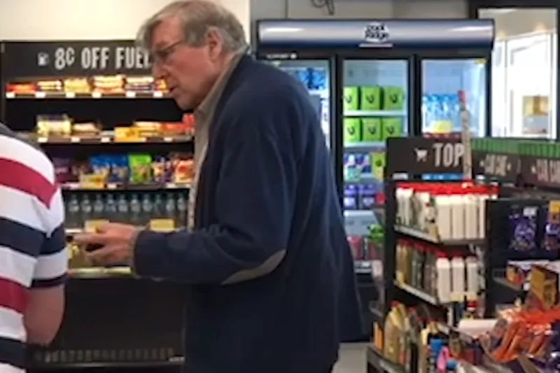 Cardinal George Pell at a service station on Wednesday.