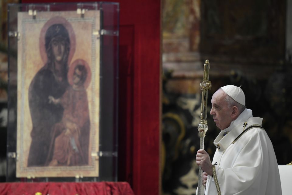 Pope Francis celebrates Easter Mass in St. Peter's Basilica at the Vatican April 12. In the background is the Marian icon, "Salus Populi Romani" (health of the Roman people). The Mass was celebrated without the presence of the public due to the coronavirus pandemic. (CNS/Vatican Media)