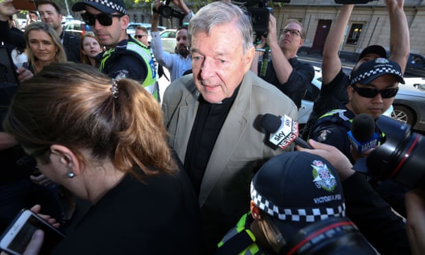 Cardinal George Pell makes his way through members of the media to the court in Melbourne on 27 February 2019. The ABC has come under scrutiny from Pell supporters for its coverage of the cardinal. Photograph: Asanka Brendon Ratnayake/AFP/Getty Images