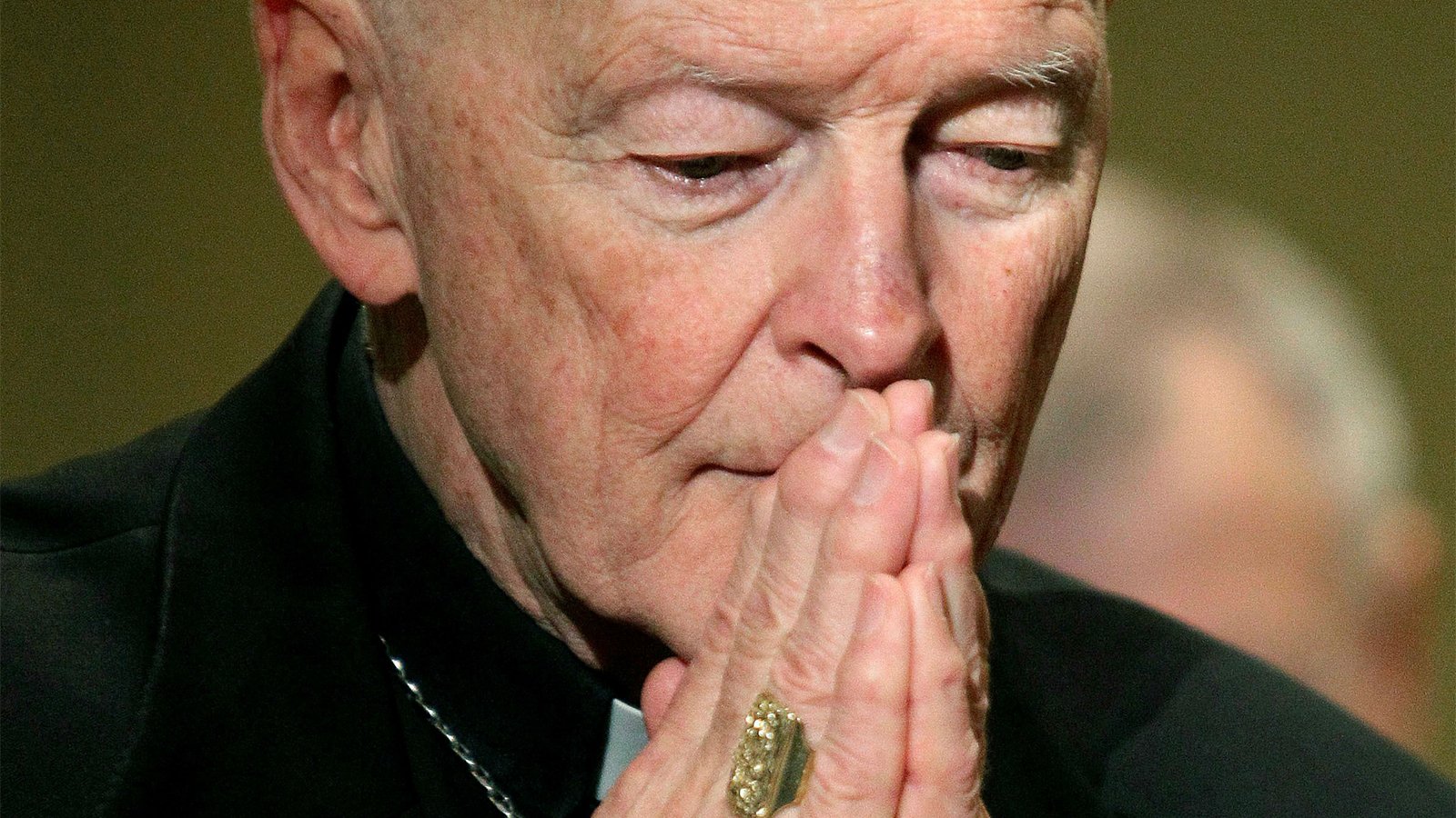 In this Nov. 14, 2011, file photo, former Cardinal Theodore McCarrick prays during the U.S. Conference of Catholic Bishops' annual fall assembly in Baltimore. (AP Photo/Patrick Semansky)