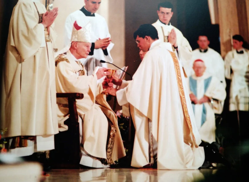 Former Cardinal Theodore McCarrick, left, then the archbishop of Washington, confers the chalice during the ordination of Mark White in 2003. Courtesy photo