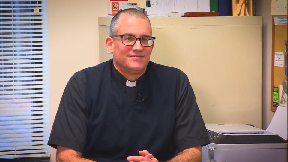 Rev. Mark D. White (photo taken by 8News)