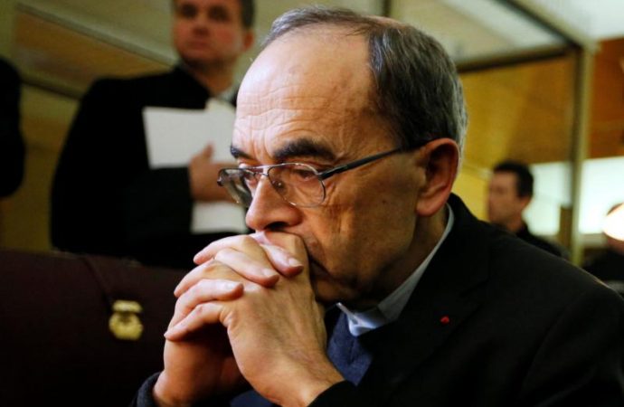 French Cardinal Philippe Barbarin of Lyon pauses at the courthouse in Lyon Jan. 7, 2019. Pope Francis accepted the resignation of Barbarin March 6, 2020, less than six weeks after a French appeals court overturned his conviction for failing to report clerical sexual abuse. (Credit: Emmanuel Foudrot/Reuters via CNS.)