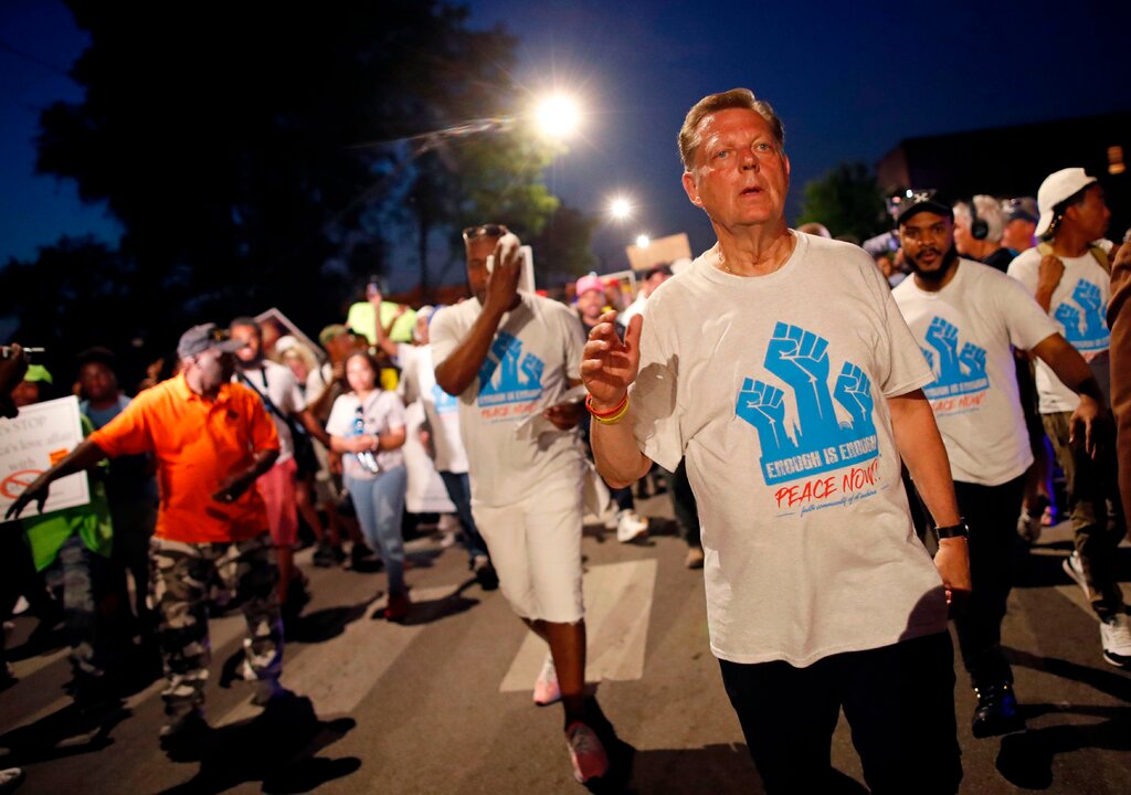 Fatherl Pfleger at a peace rally in Chicago in 2018.