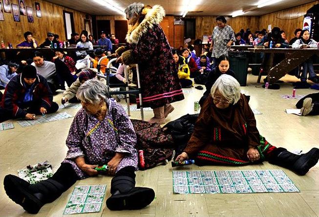 Alice Pete, Winefred Otten, and Daisy Pete at nightly bingo game in Stebbins AK, February 2005. Photo by Damon Winter.