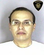 Rev. Angel Perez's booking mug after being arrested on child sexual abuse charges.