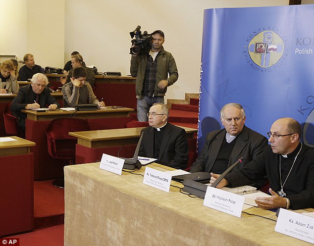 Bishop Wojciech Polak, right, of Poland's Catholic Church admitted to cases of pedophilia among Polish priests. Victims deserved an apology, he said