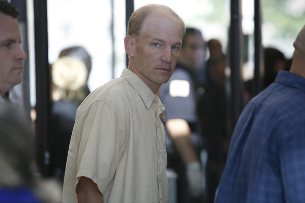 Daniel McCormack (center) arrives at the Cook County Criminal Courts Building in Chicago in 2008. (Michael Tercha, Chicago Tribune)