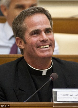 Happy couple: Williams (left) resigned the priesthood last year after admitting the he fathered a son several years ago with art historian Elizabeth Lev, pictured right with the boy