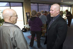 Fr. Mike O'Connell, right, at Our Lady of the Woods Catholic Church in Orland Park, Ill., Tuesday, Nov. 10, 2009. | File photo