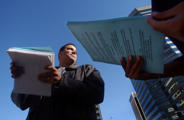 Carlos Perez-Carrillo hands out fliers for the support group Survivors Network of Those Abused by Priests in Sherman Oaks in 2003. A former altar boy, Perez-Carrillo said he was molested by Salazar when the priest was still in the seminary. (Los Angeles Times) More photos
