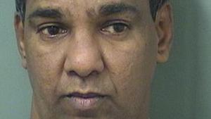 Father Jose Palimattom, 47, is accused of showing child pornography to a teen boy. (The Palm Beach County Sheriff's Office)