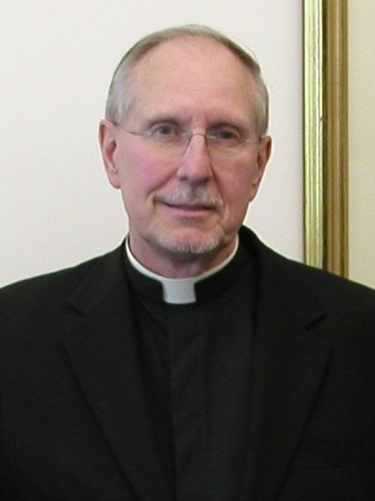 Monsignor Raymond Cole in 2013 was suspended as pastor of the St. Joseph Parish following an accusation of sexual abuse decades ago.