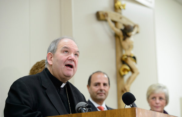 Archbishop Bernard Hebda at a news conference Friday. The settlement relates to claims that the archdiocese failed to protect children from sexual abuse.