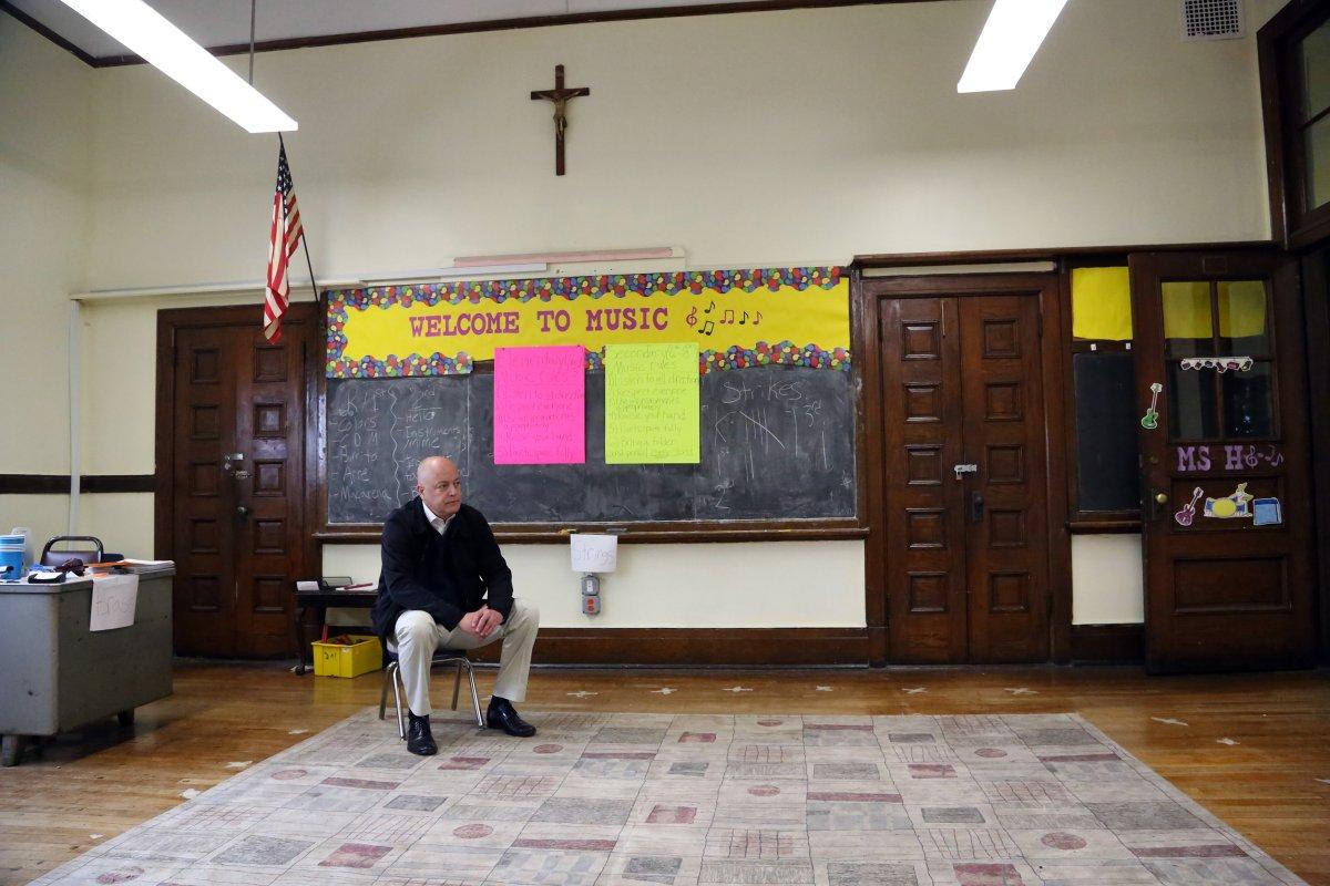 Jimenez sits in the room that was his 8th grade classroom of St. Joseph the Worker Catholic Academy in Windsor Terrace, Brooklyn. (JEFFERSON SIEGEL/NEW YORK DAILY NEWS)
