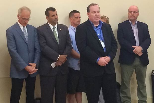 Joe Crowley, front, who was sexually abused at the age of 15 by a Roman Catholic priest in Boston, speaks at Tuesday's news conference in Philadelphia. 'It takes a long time' for victims to come forward, he said. 'Some people never get it...'