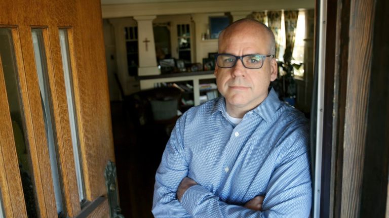David McGuire, shown at his home in Los Angeles, said he was abused by the Rev. Eugene Vollmer, a priest at St. Thomas the Apostle parish in West Hempstead, from 1980 to 1982. Vollmer died in 2016. Photo Credit: Ana P. Gutierrez-Garcia