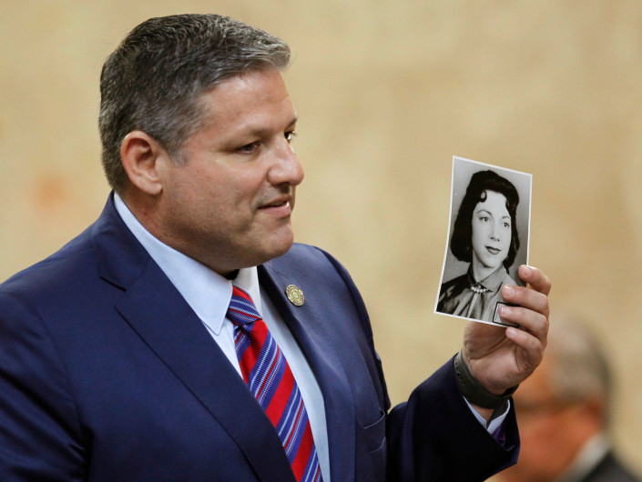 Nathan Lambrecht, The Monitor via AP Hidalgo County Assistant District Attorney Michael Garza hold a photograph of Irene Garza as he presents his closing argument in John Feit’s murder trial, Thursday, Dec. 7, 2017, at the Hidalgo County Courthouse in Edinburg, Texas. Feit, a former priest, is accused of suffocating Irene Garza in April 1960, after she went to confession at Sacred Heart Catholic Church in McAllen.