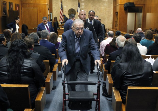 Nathan Lambrecht, The Monitor via APFormer priest John Feit leave the courtroom following closing arguments in his murder trial, Thursday, Dec. 7, 2017, at the Hidalgo County Courthouse in Edinburg, Texas. Feit is accused of suffocating Irene Garza in April 1960, after she went to confession at Sacred Heart Catholic Church in McAllen.