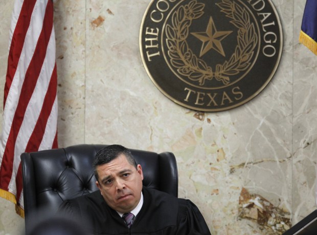 Nathan Lambrecht, The Monitor via AP92nd state District Court Judge Luis Singleterry listens to closing arguments during John Feit’s murder trial, Thursday, Dec. 7, 2017, at the Hidalgo County Courthouse in Edinburg, Texas. Feit, a former priest, is accused of suffocating Irene Garza in April 1960, after she went to confession at Sacred Heart Catholic Church in McAllen.