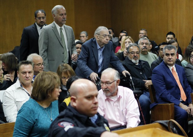 Nathan Lambrecht, The Monitor via APFormer priest John Feit, center, enters the courtroom for closing arguments in his murder trial, Thursday, Dec. 7, 2017, at the Hidalgo County Courthouse in Edinburg, Texas. Feit is accused of suffocating Irene Garza in April 1960, after she went to confession at Sacred Heart Catholic Church in McAllen.